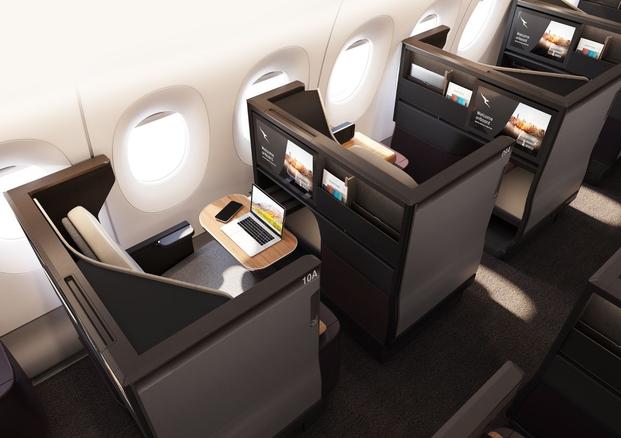 Qatar Airways’ Qsuite Next Gen with taller dividers and movable 4K OLED screens. Photo by Qatar Airways.