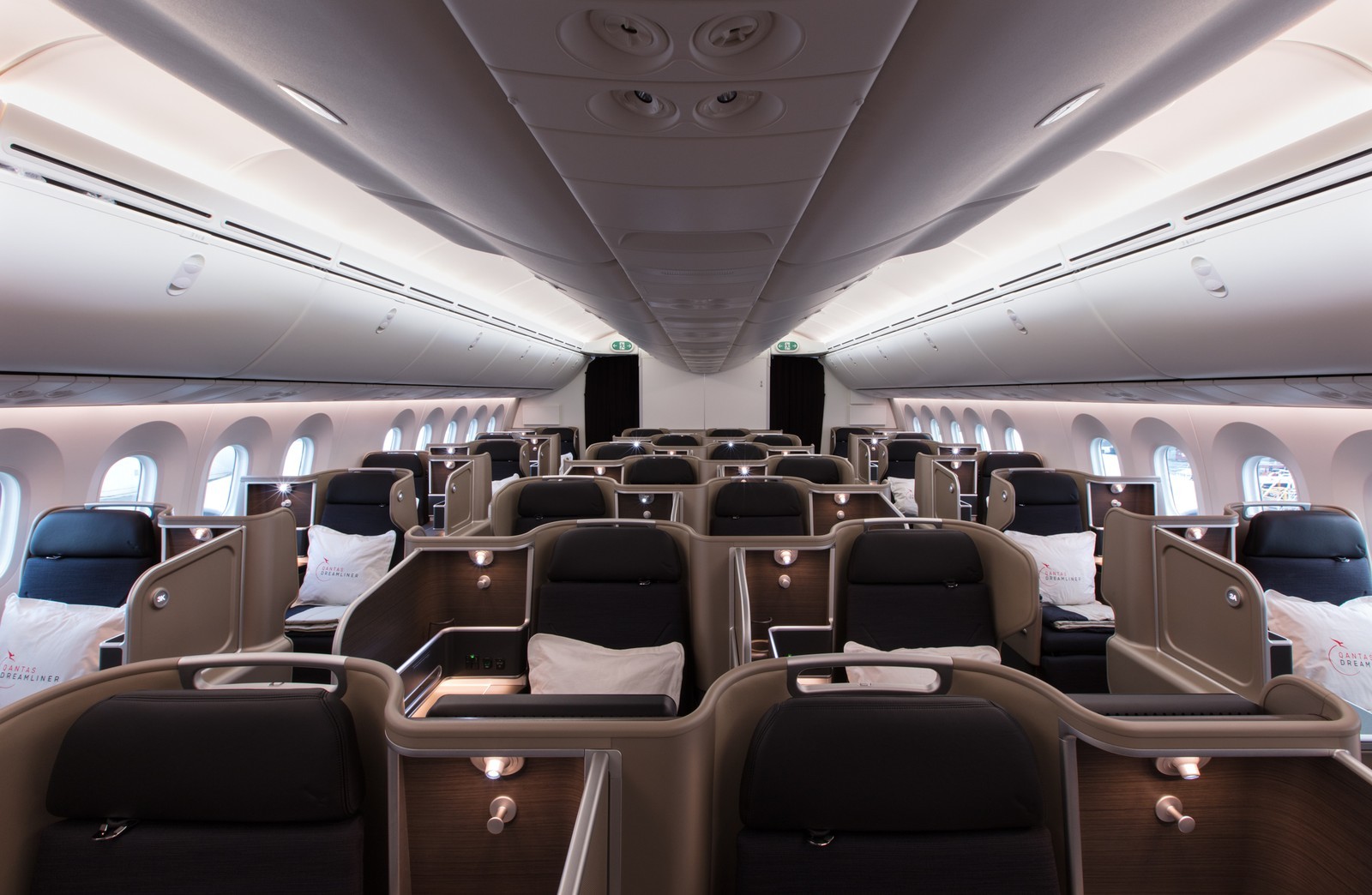 Lie-flat Business Class cabin in a 1-2-1 configuration on the Qantas Boeing 787 Dreamliner, providing direct aisle access for every passenger on long-haul flights. Photo by Qantas.
