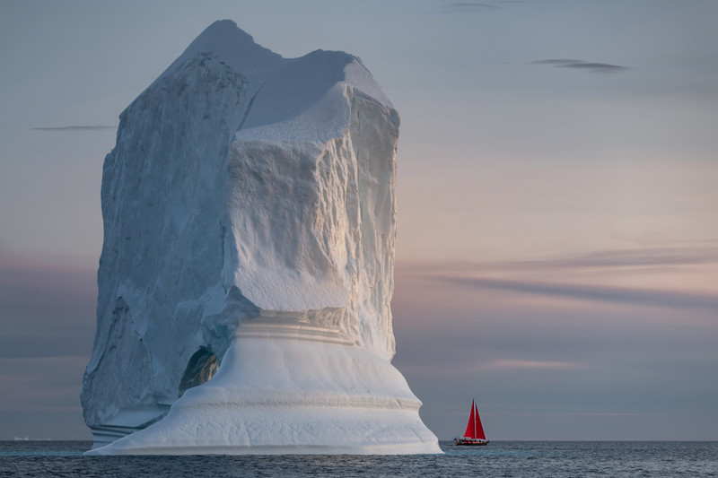 Massive Iceberg and Red Sailboat in Greenland's Ilulissat Icefjord | Disko Bay Arctic Landscape Photography