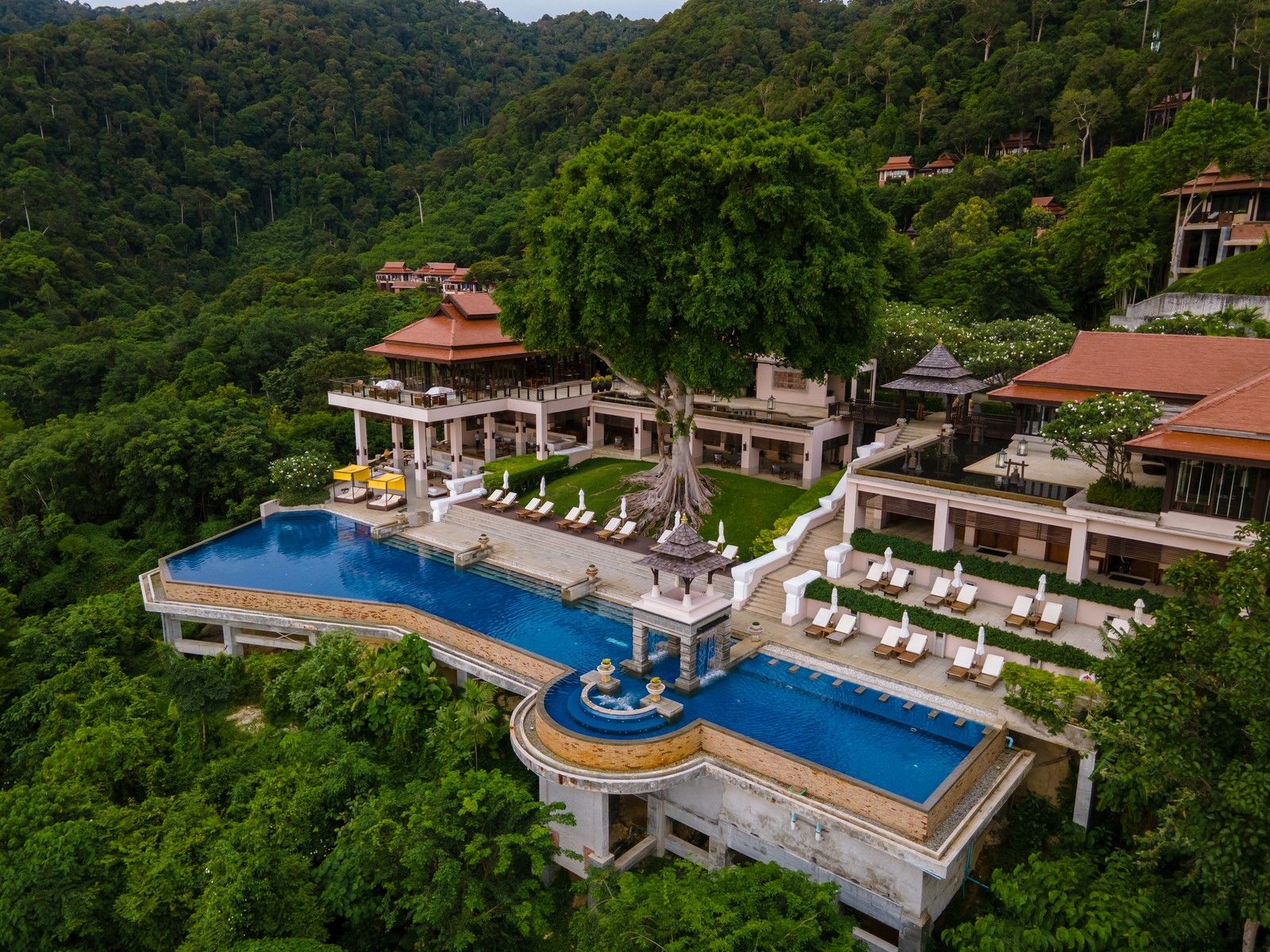 Hillside Luxury Resort in the Jungle of Koh Lanta overlooking lush green mountains, where luxury blends seamlessly with Thailand’s tropical landscape.
