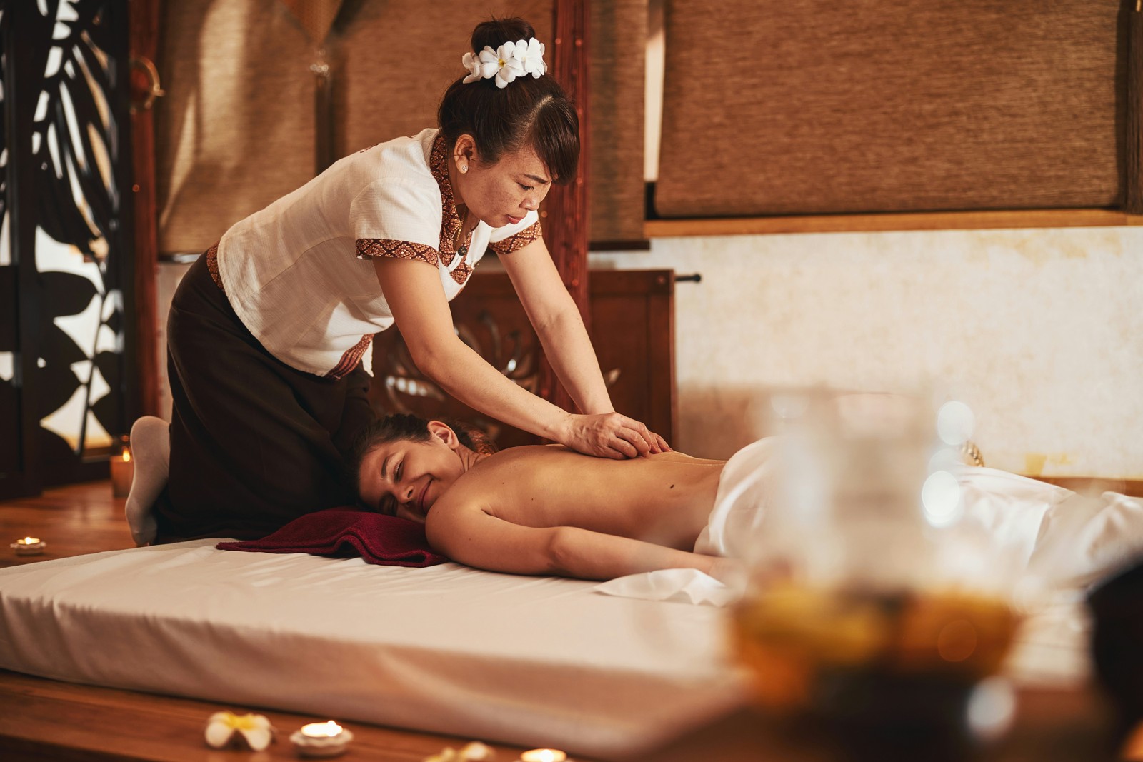 A moment of deep relaxation during an authentic Thai massage, one of the country’s most famous wellness traditions.